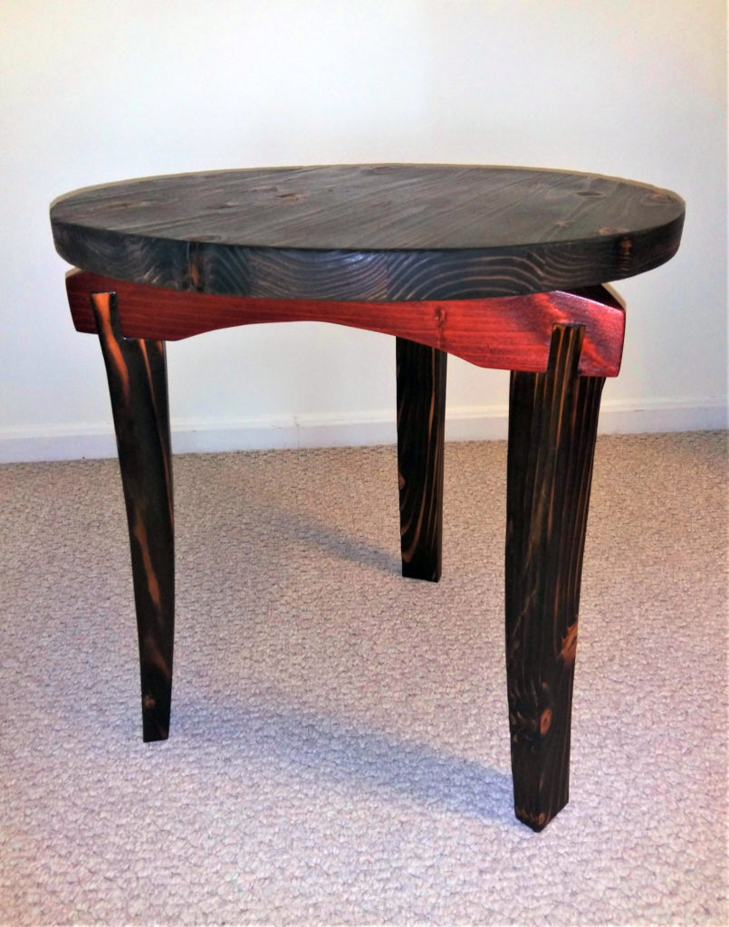 Fire-finished side table.